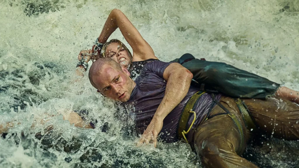 Charlize Theron and Taron Egerton in Apex (2026)